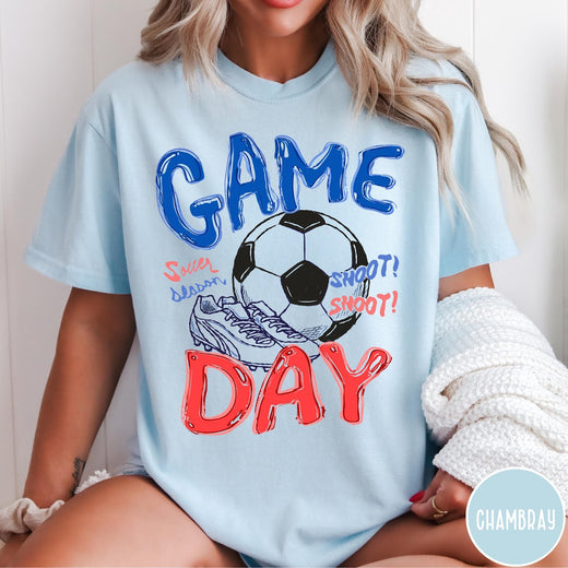 Comfort Colors tee in Chambray featuring soccer graphic with a ball, cleats, and Game Day text