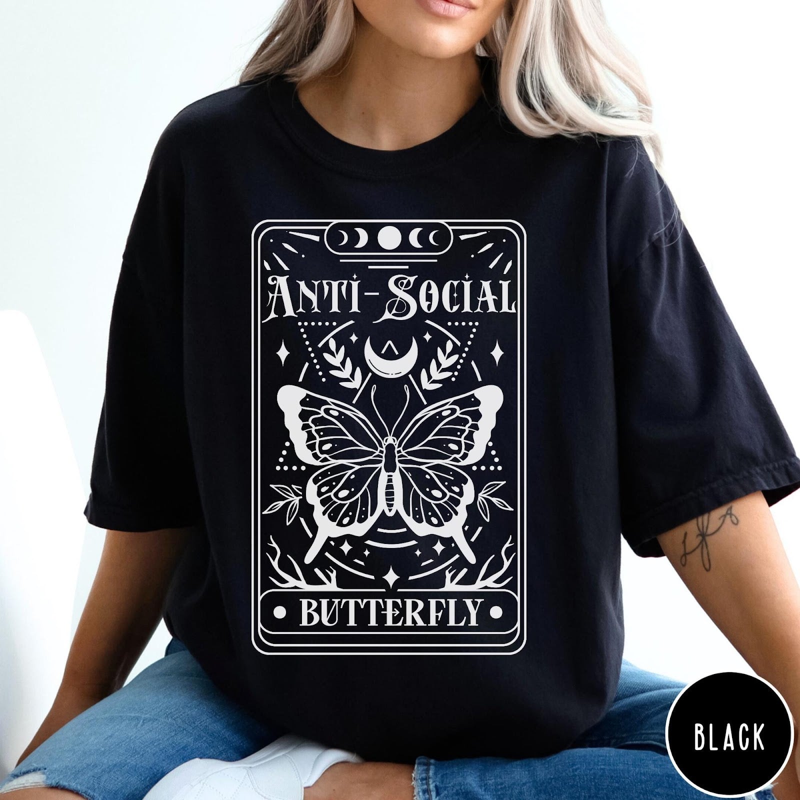 Comfort Colors tee in Black featuring tarot card style graphic with butterfly and celestial moon phase design