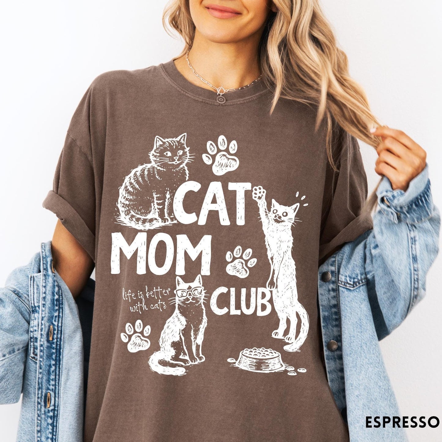 Comfort Colors tee in Espresso featuring vintage style graphic with cats, paw prints, and cat mom club text