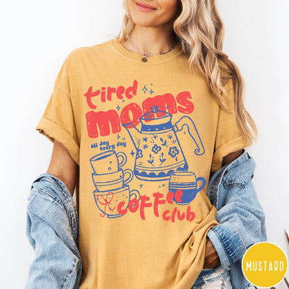 Comfort Colors tee in Mustard featuring coffee themed graphic with teapot and stacked mugs and text design
