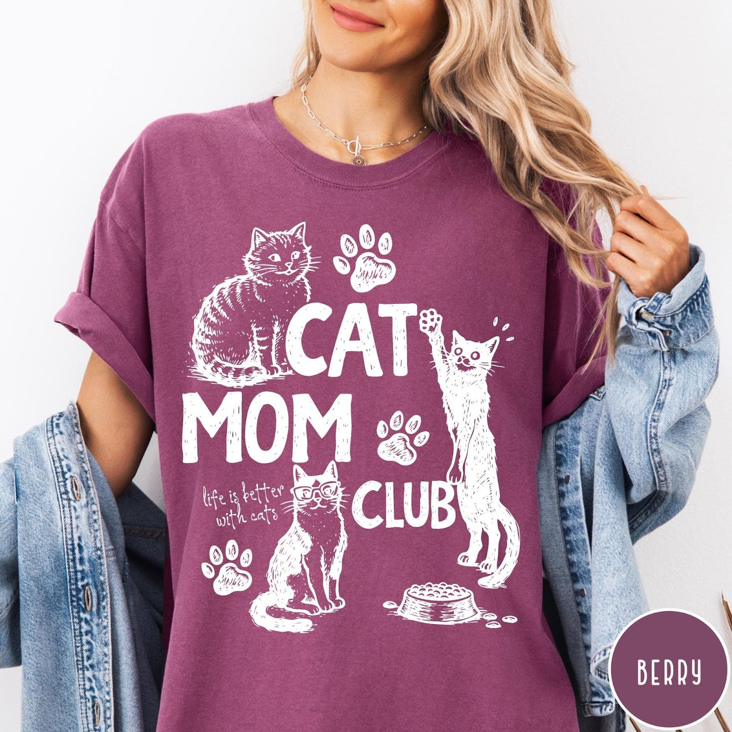 Comfort Colors tee in Berry featuring vintage style graphic with cats, paw prints, and cat mom club text