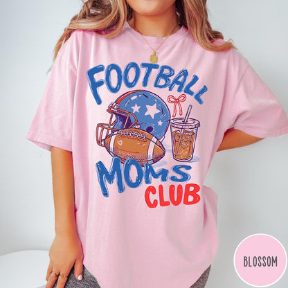 Comfort Colors tee in Blossom featuring football mom lifestyle graphic with helmet, football, and iced coffee