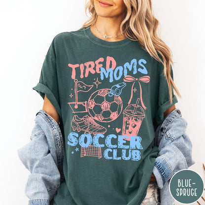 Comfort Colors tee in Blue Spruce featuring soccer mom life graphic with soccer ball and iced coffee