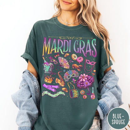 Comfort Colors tee in Blue Spruce featuring vintage style Mardi Gras icons including a saxophone, mask, and umbrella.