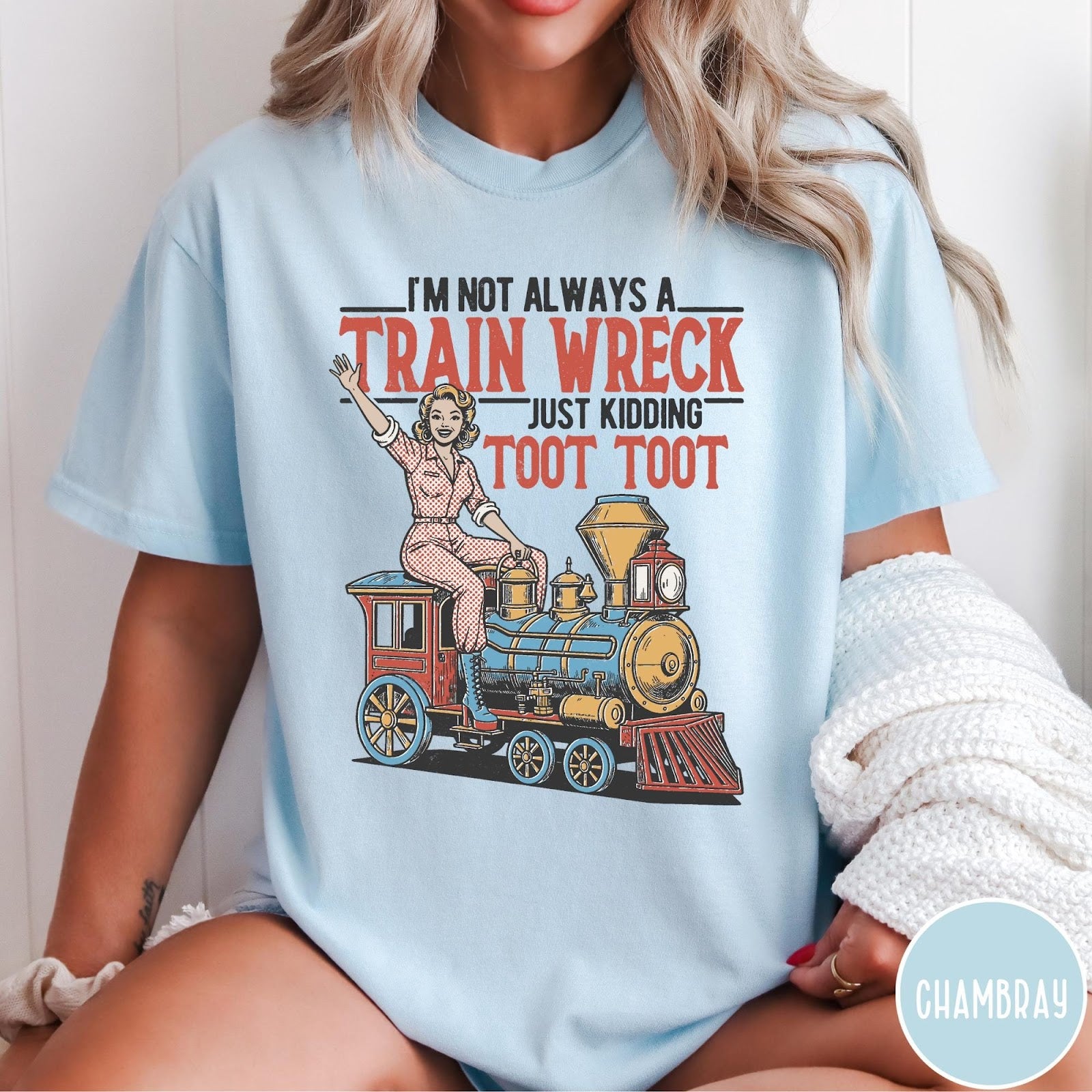 Comfort Colors tee in Chambray featuring vintage style pin-up woman sitting on a steam train graphic
