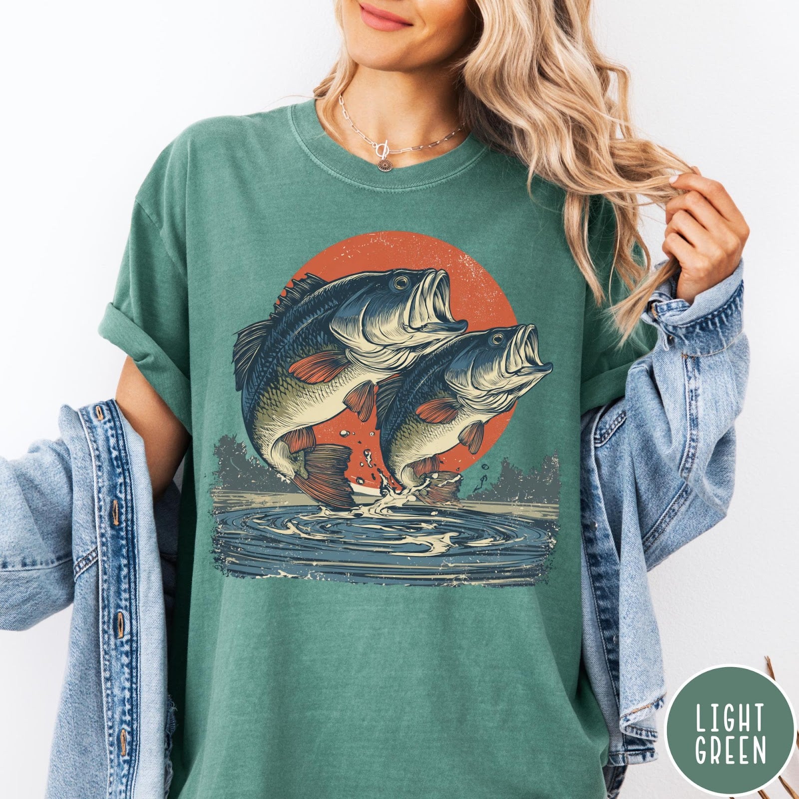 Comfort Colors tee in Light Green featuring vintage style graphic of two bass fish jumping out of water