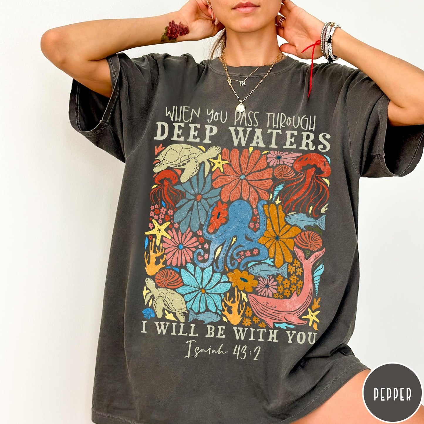 Comfort Colors tee in Pepper featuring retro style ocean life graphic with Isaiah 43:2 Bible verse text