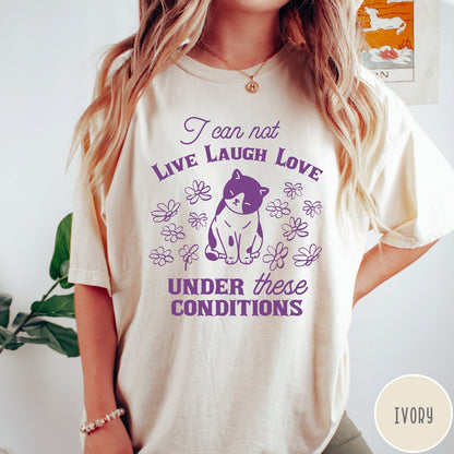 Comfort Colors tee in Ivory featuring whimsical graphic style with a cat and flowers and text.