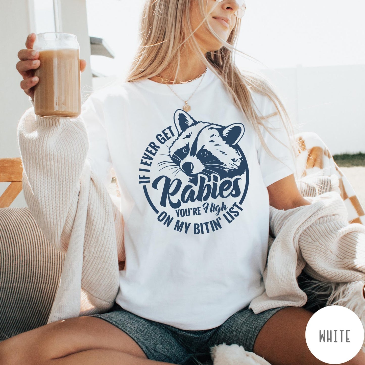 Comfort Colors tee in White featuring screen print style graphic of a raccoon with funny rabies text