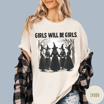 Comfort Colors tee in Ivory featuring vintage style graphic of five witches holding hands in a circle