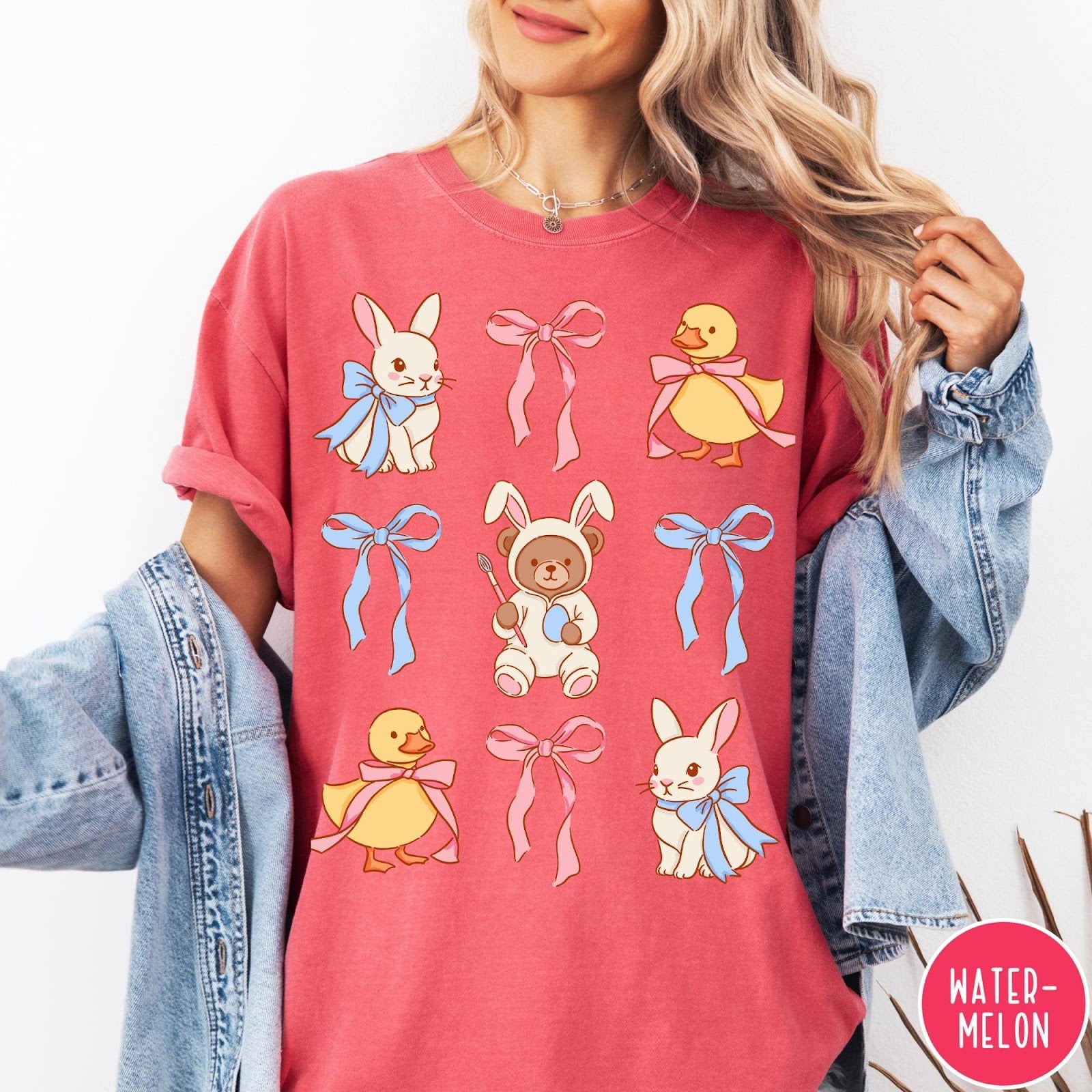 Comfort Colors tee in Watermelon featuring vintage style graphic with Easter bunnies, ducks, and pink blue bows