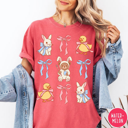 Comfort Colors tee in Watermelon featuring vintage style graphic with Easter bunnies, ducks, and pink blue bows