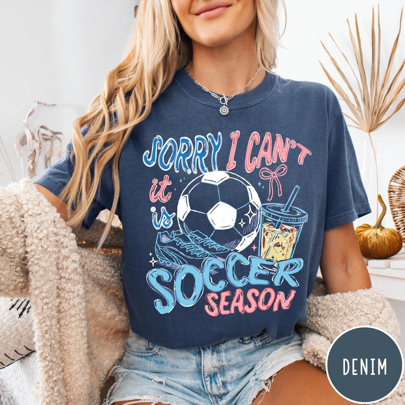 Comfort Colors tee in Denim featuring screen print style soccer season graphic with ball and iced coffee