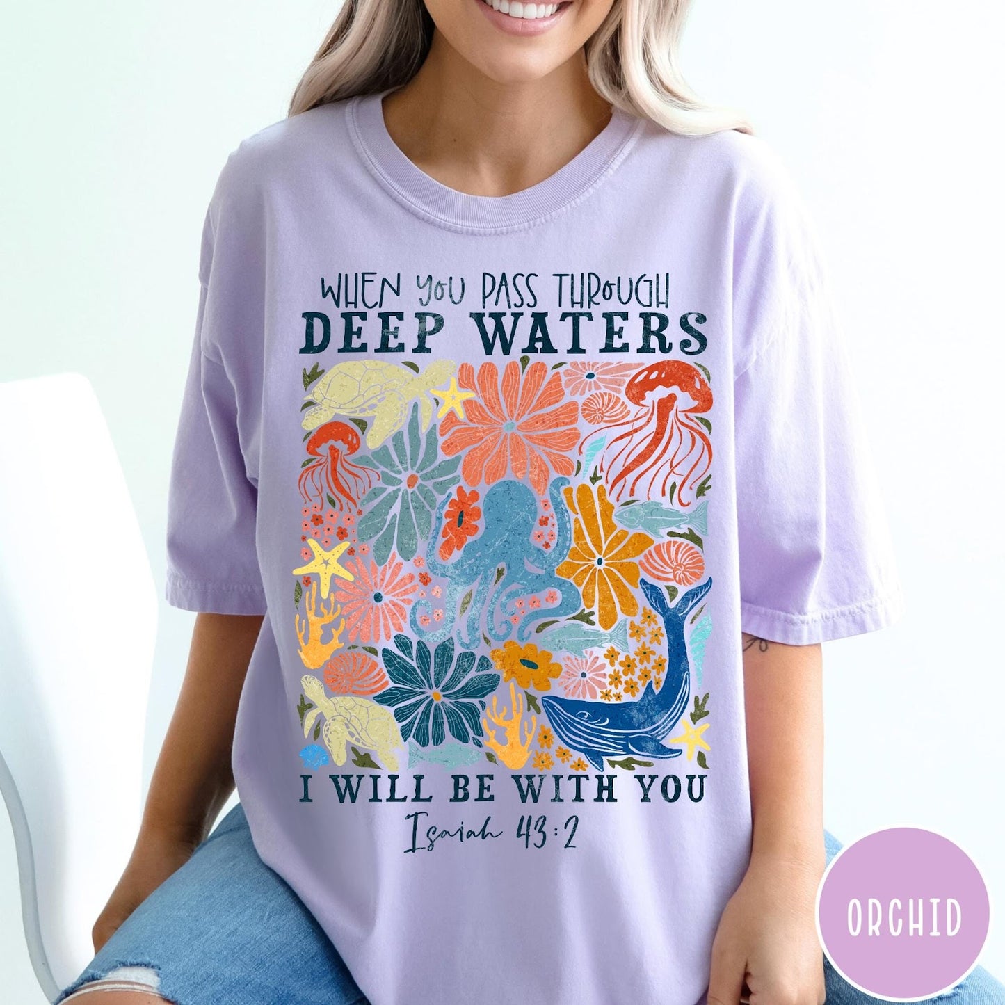 Comfort Colors tee in Orchid featuring retro style ocean life graphic with Isaiah 43:2 Bible verse text