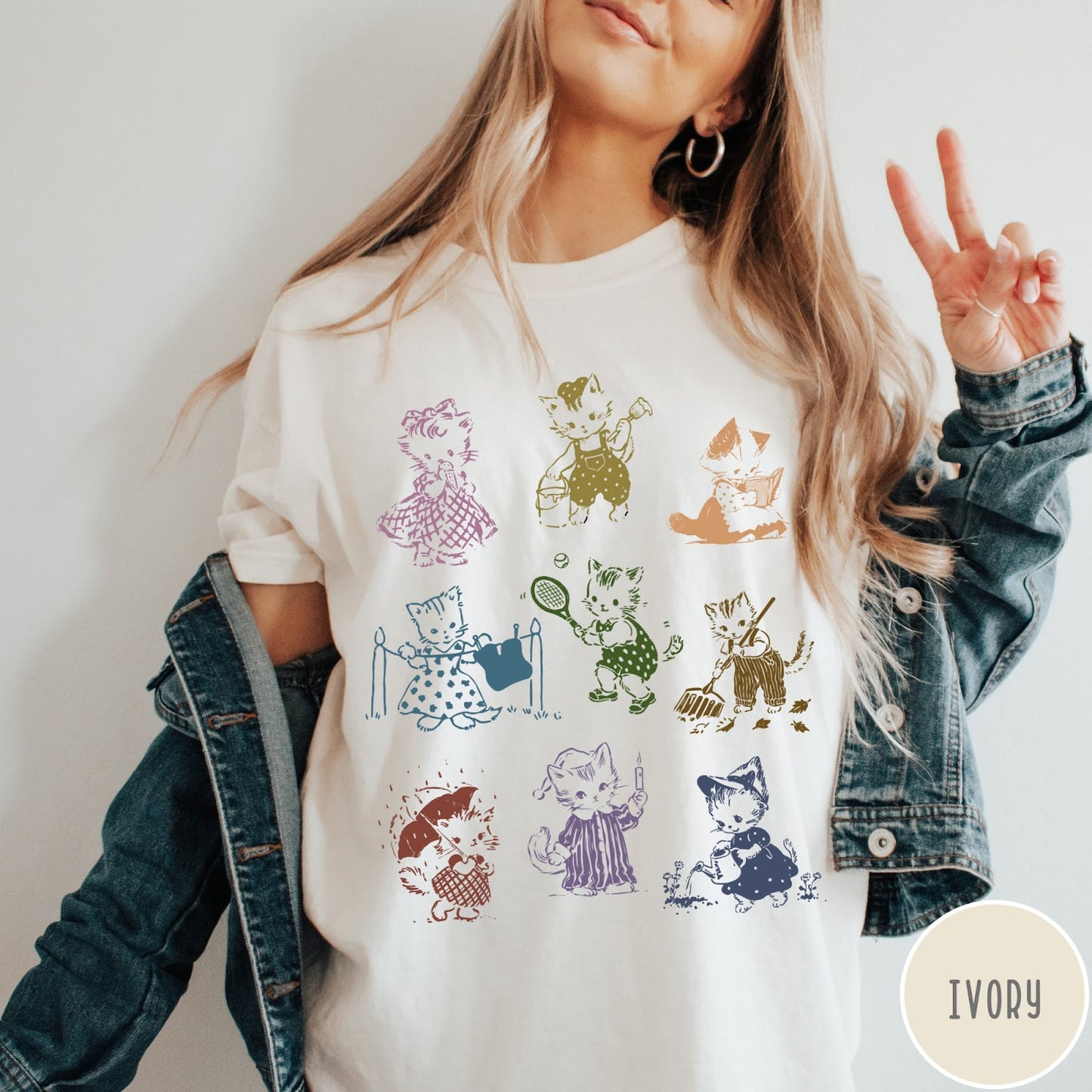 Comfort Colors tee in Ivory featuring vintage retro style graphic of nine kittens doing various daily activities