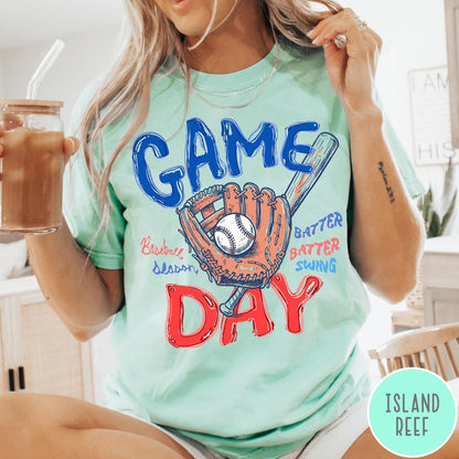Comfort Colors tee in Island Reef featuring baseball design with glove, ball, bat, and Game Day text graphic