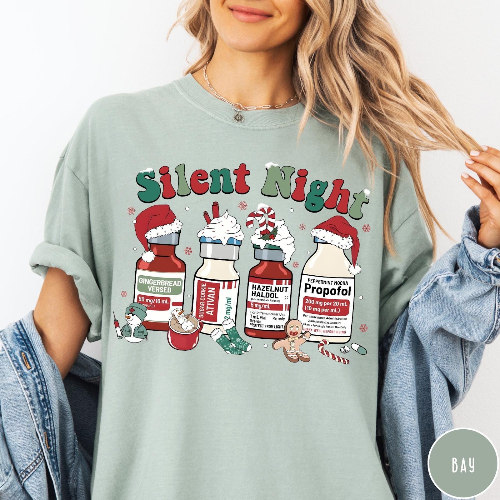 Comfort Colors tee in Bay featuring holiday graphic with medical vials styled as festive holiday treats