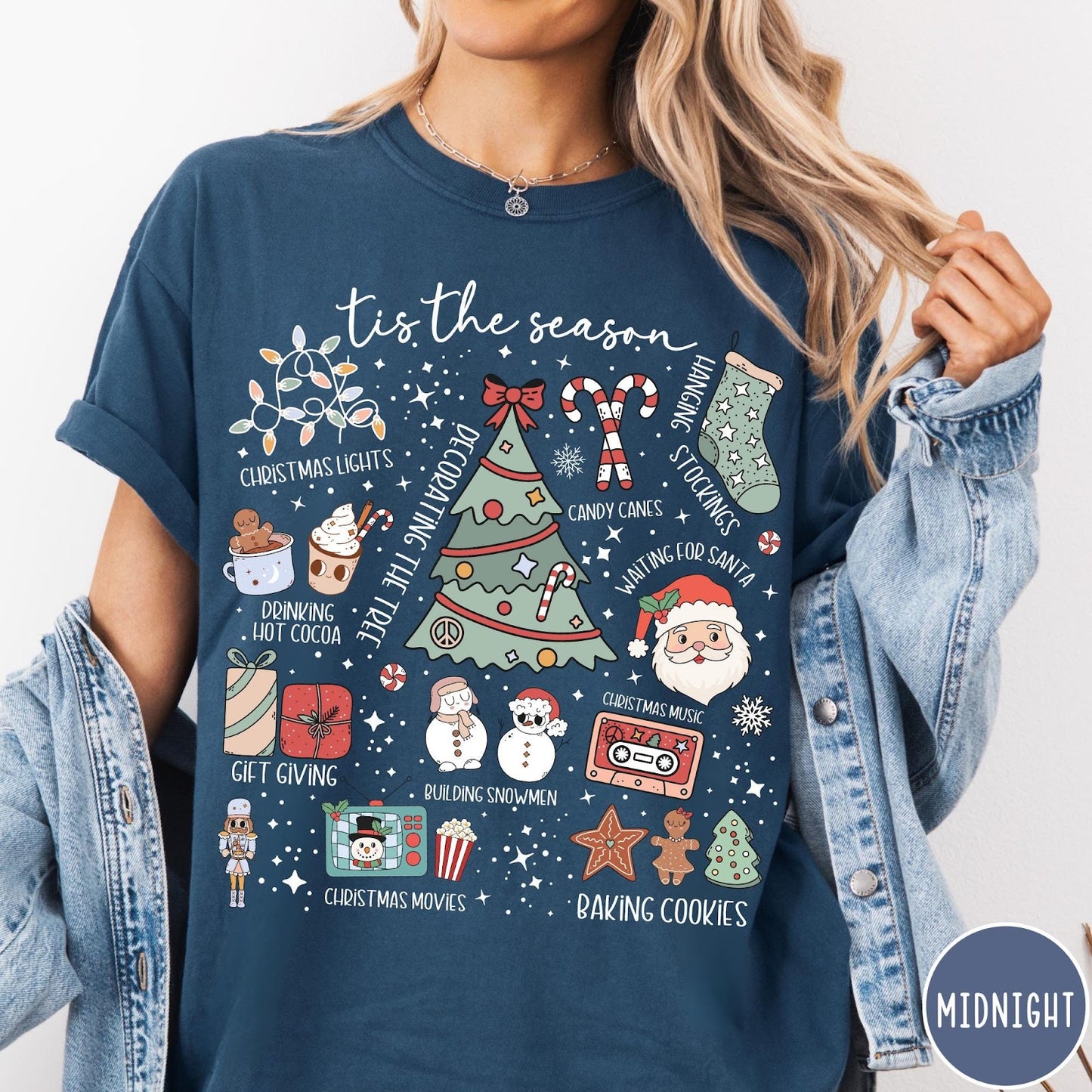 Comfort Colors tee in Midnight featuring festive holiday graphic with Christmas icons like a tree and cocoa