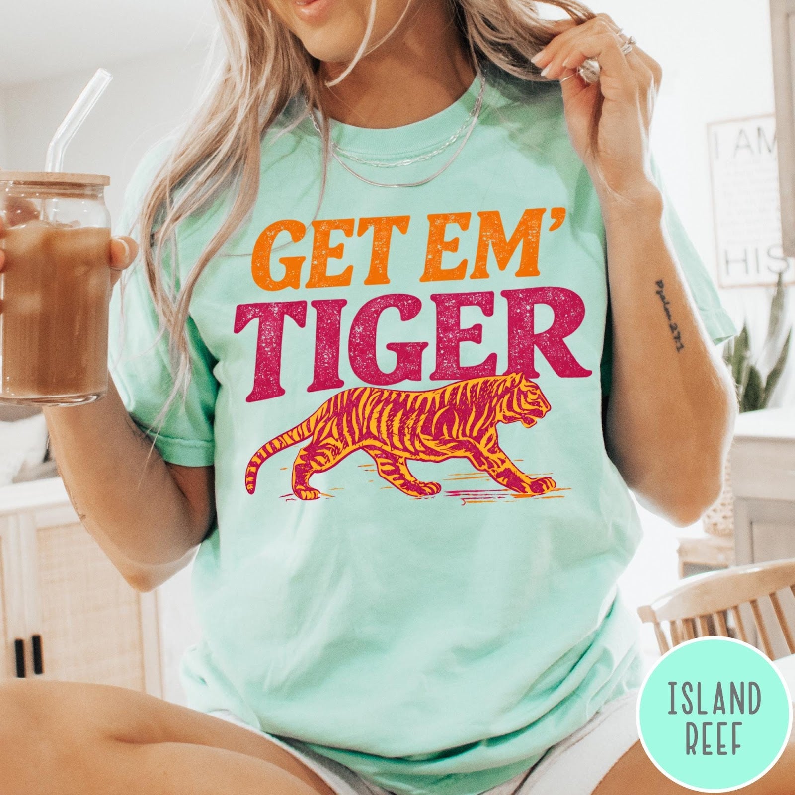 Comfort Colors tee in Island Reef featuring vintage style graphic with orange text and a walking tiger illustration