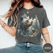 Comfort Colors tee in Pepper featuring vintage nature style graphic of two bears in a forest