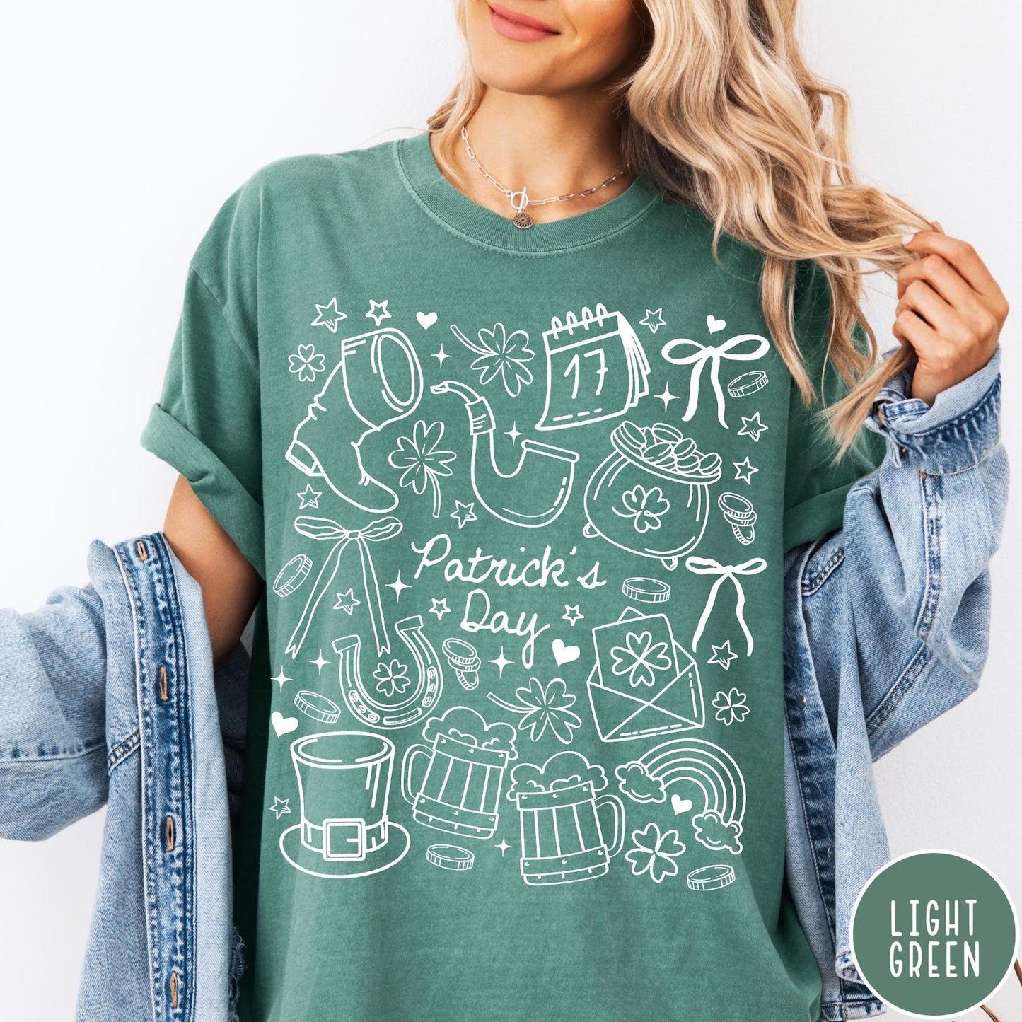 Comfort Colors tee in Light Green featuring line art style St. Patrick's Day icons and symbols