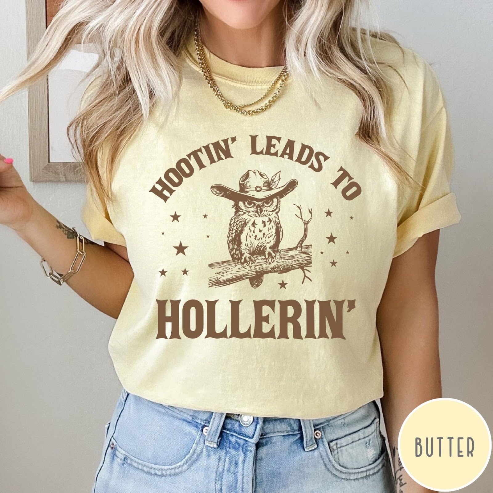 Comfort Colors tee in Butter featuring western style graphic of an owl wearing a cowboy hat on branch