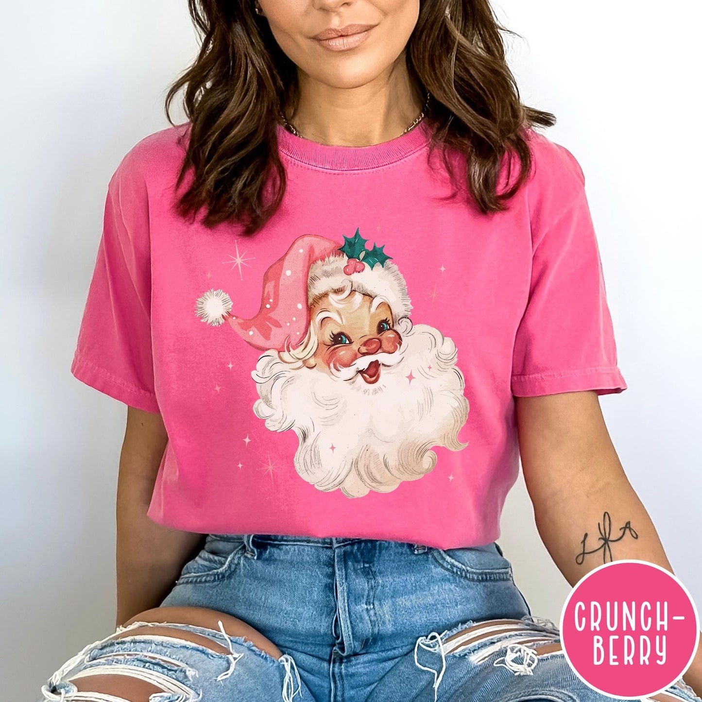 Comfort Colors tee in Crunchberry featuring retro Christmas style graphic of a smiling Santa Claus with pink hat