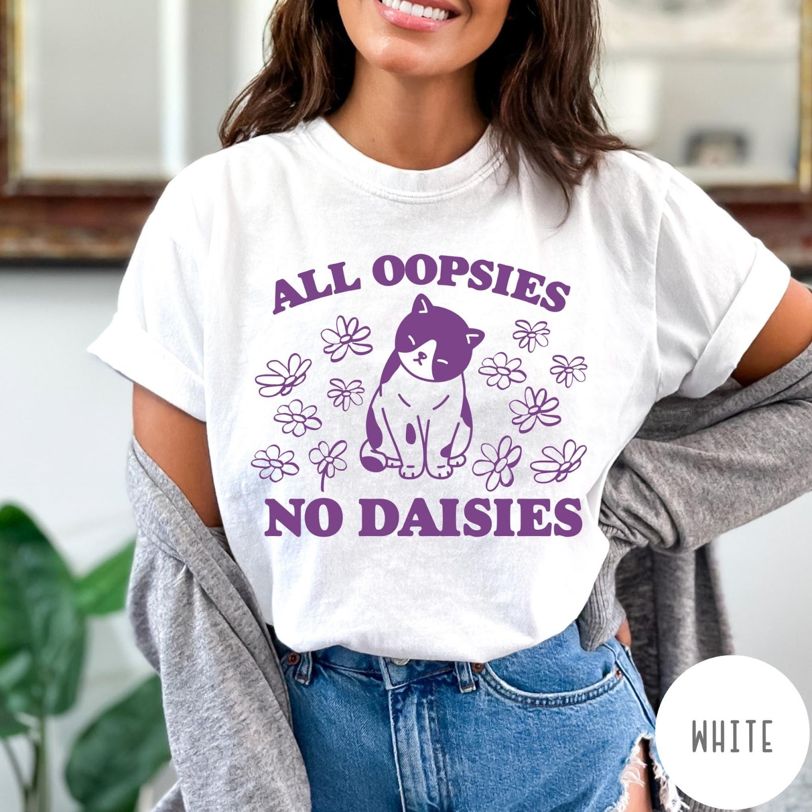 Comfort Colors tee in White featuring cat graphic with purple text reading All Oopsies No Daisies