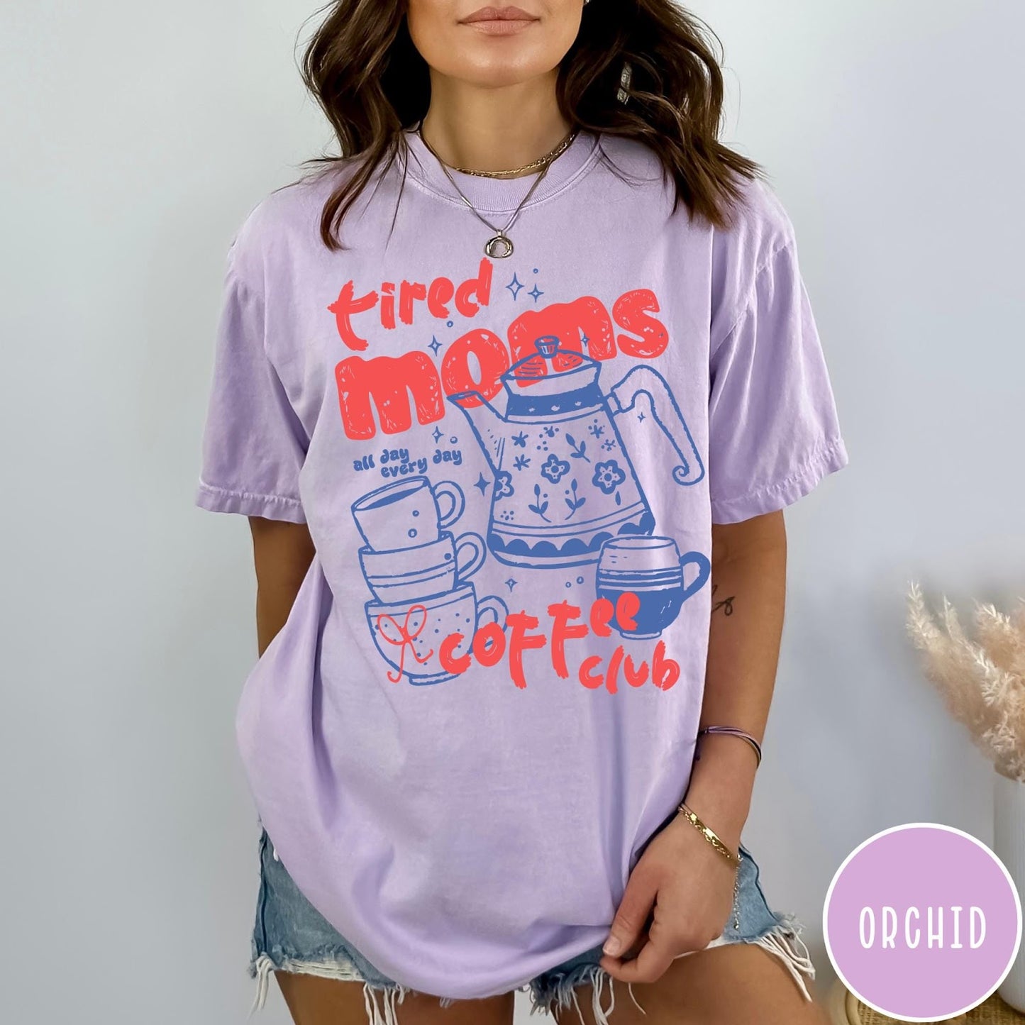 Comfort Colors tee in Orchid featuring coffee themed graphic with teapot and stacked mugs and text design