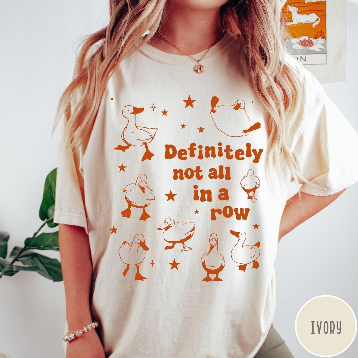 Comfort Colors tee in Ivory featuring whimsical duck design with scattered stars and text about ducks.