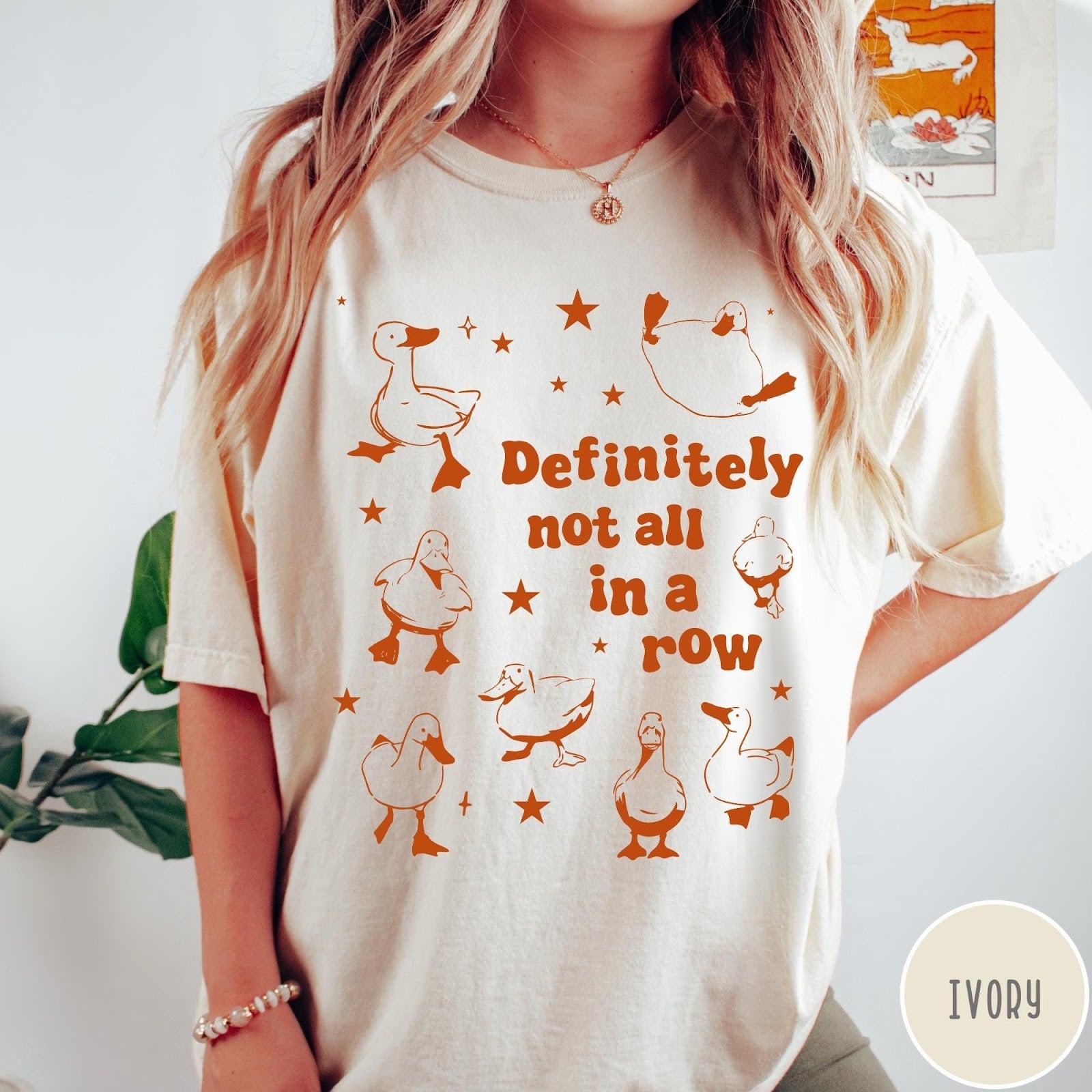 Comfort Colors tee in Ivory featuring whimsical duck design with scattered stars and text about ducks.