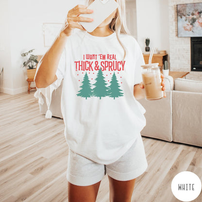 Comfort Colors tee in White featuring Christmas tree design with text I Want Em Real Thick and Sprucy