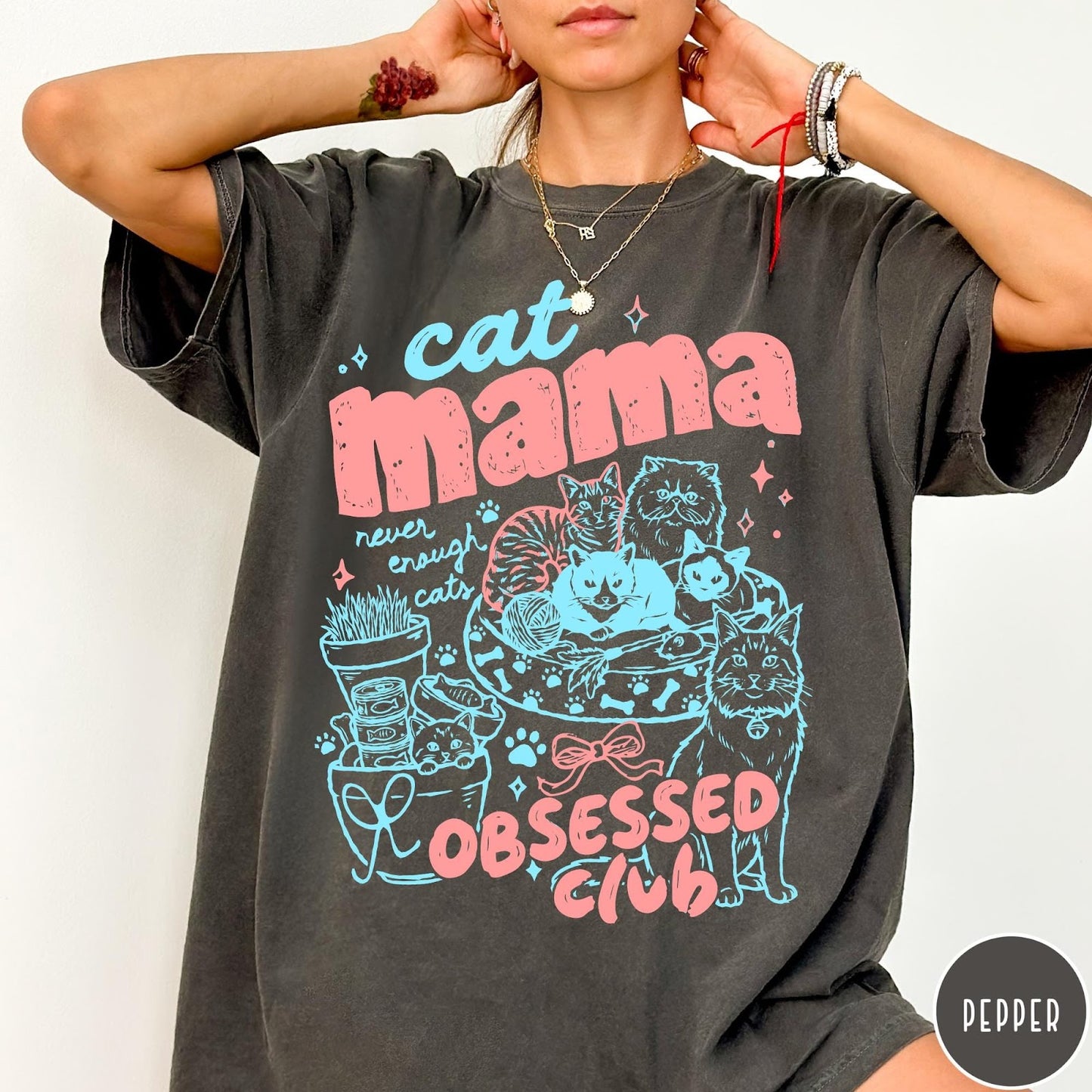 Comfort Colors tee in Pepper featuring retro style graphic with cats, yarn, and cat mama club text