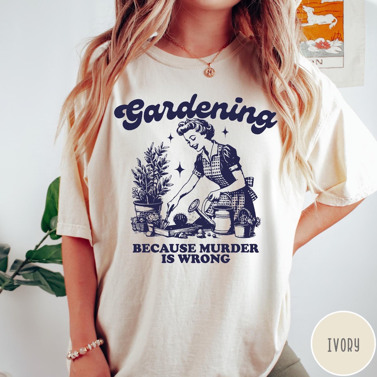 Comfort Colors tee in Ivory featuring vintage style graphic of a woman gardening with text about murder.