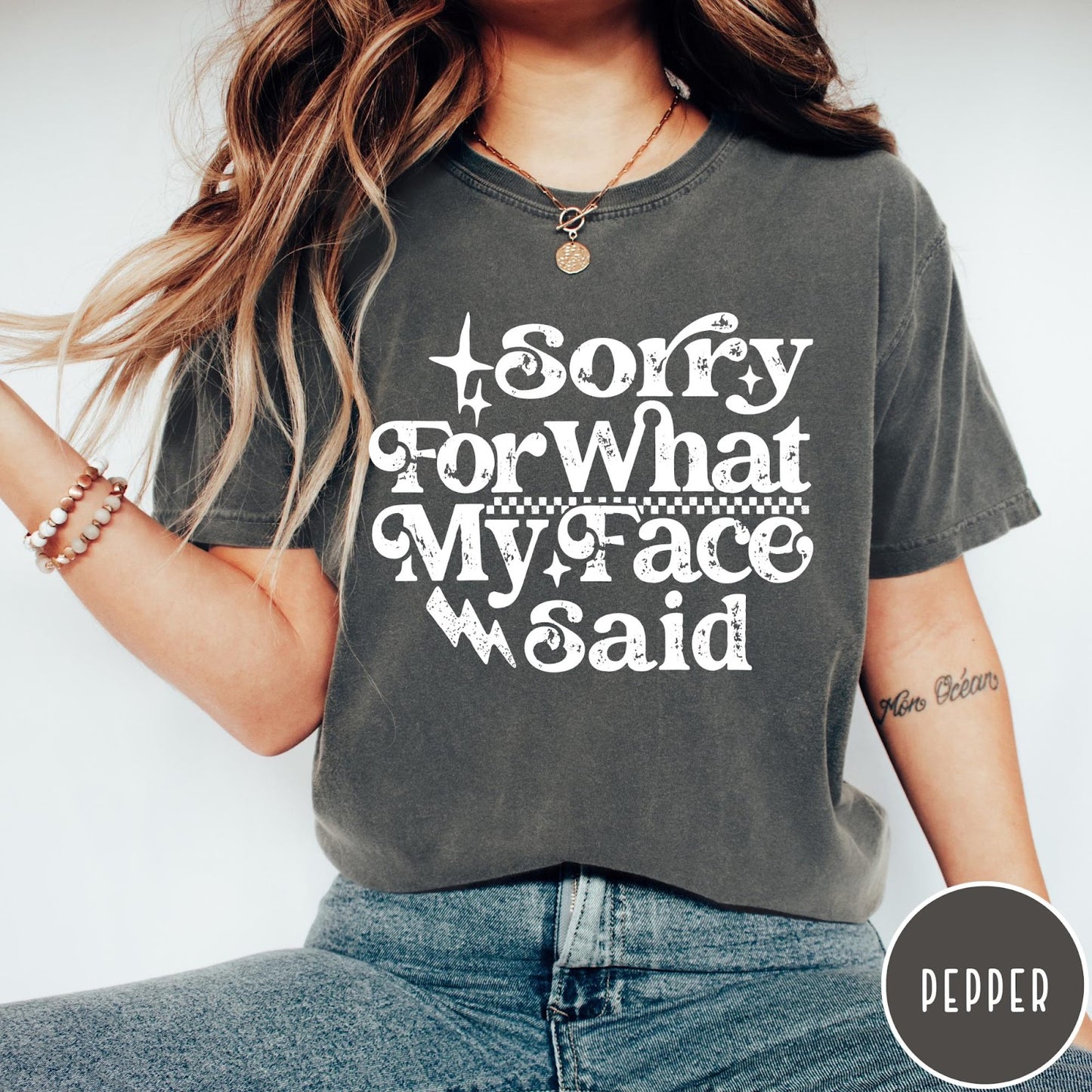 Comfort Colors tee in Pepper featuring sarcastic expression graphic with Sorry For What My Face Said text