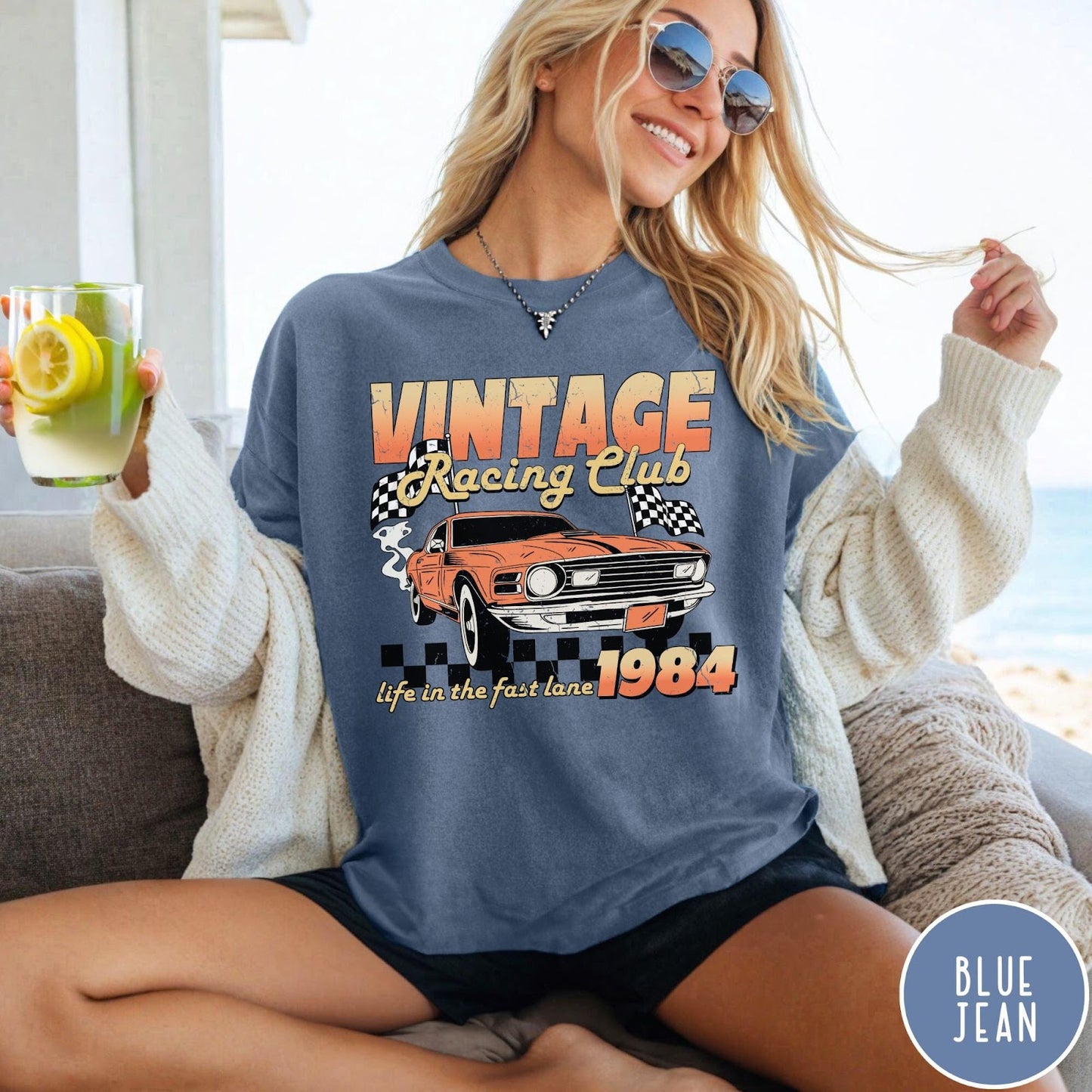 Comfort Colors tee in Blue Jean featuring vintage muscle car graphic with racing flags and 1984 text