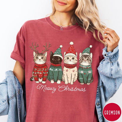 Comfort Colors tee in Crimson featuring holiday graphic of four cats wearing Christmas sweaters and hats