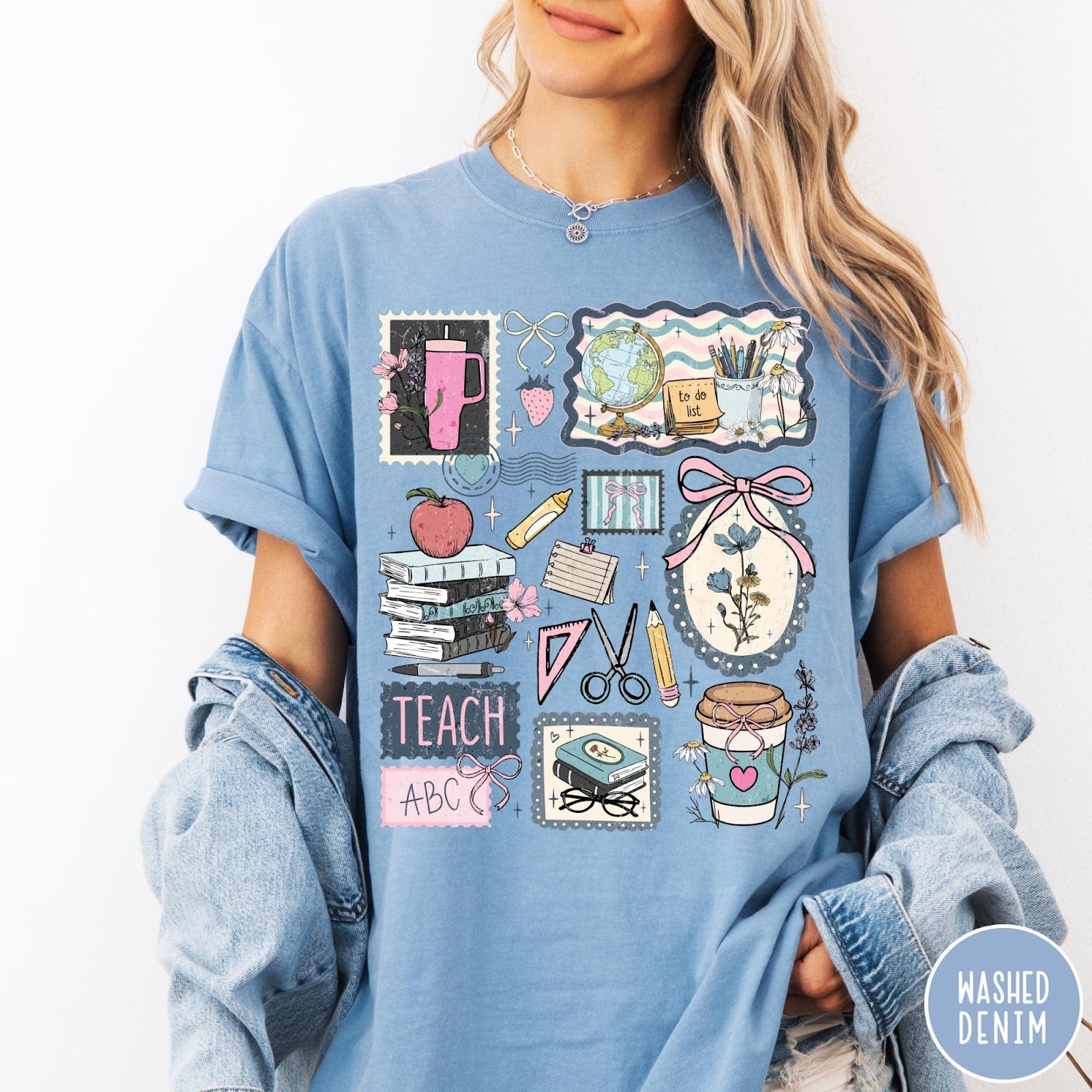 Comfort Colors tee in Washed Denim featuring collage style graphic with school supplies, books, and teacher life elements