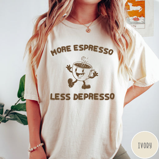 Comfort Colors tee in Ivory featuring retro style graphic of a happy coffee cup with text