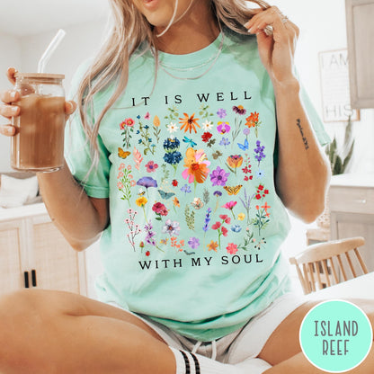 Comfort Colors tee in Island Reef featuring wildflower bouquet graphic and It Is Well With My Soul text