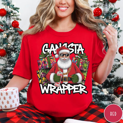 Comfort Colors tee in Red featuring cartoon style Santa Claus wearing sunglasses and gold chain holding wrapping paper