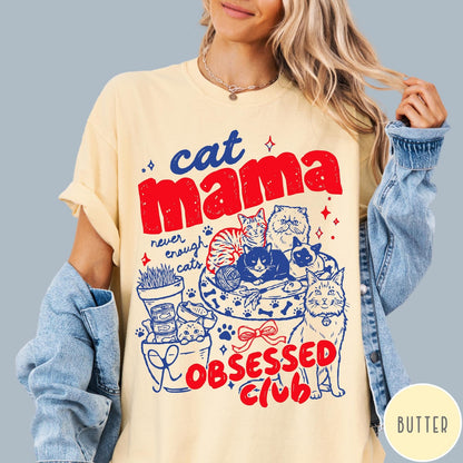 Comfort Colors tee in Butter featuring retro style graphic with cats, yarn, and cat mama club text