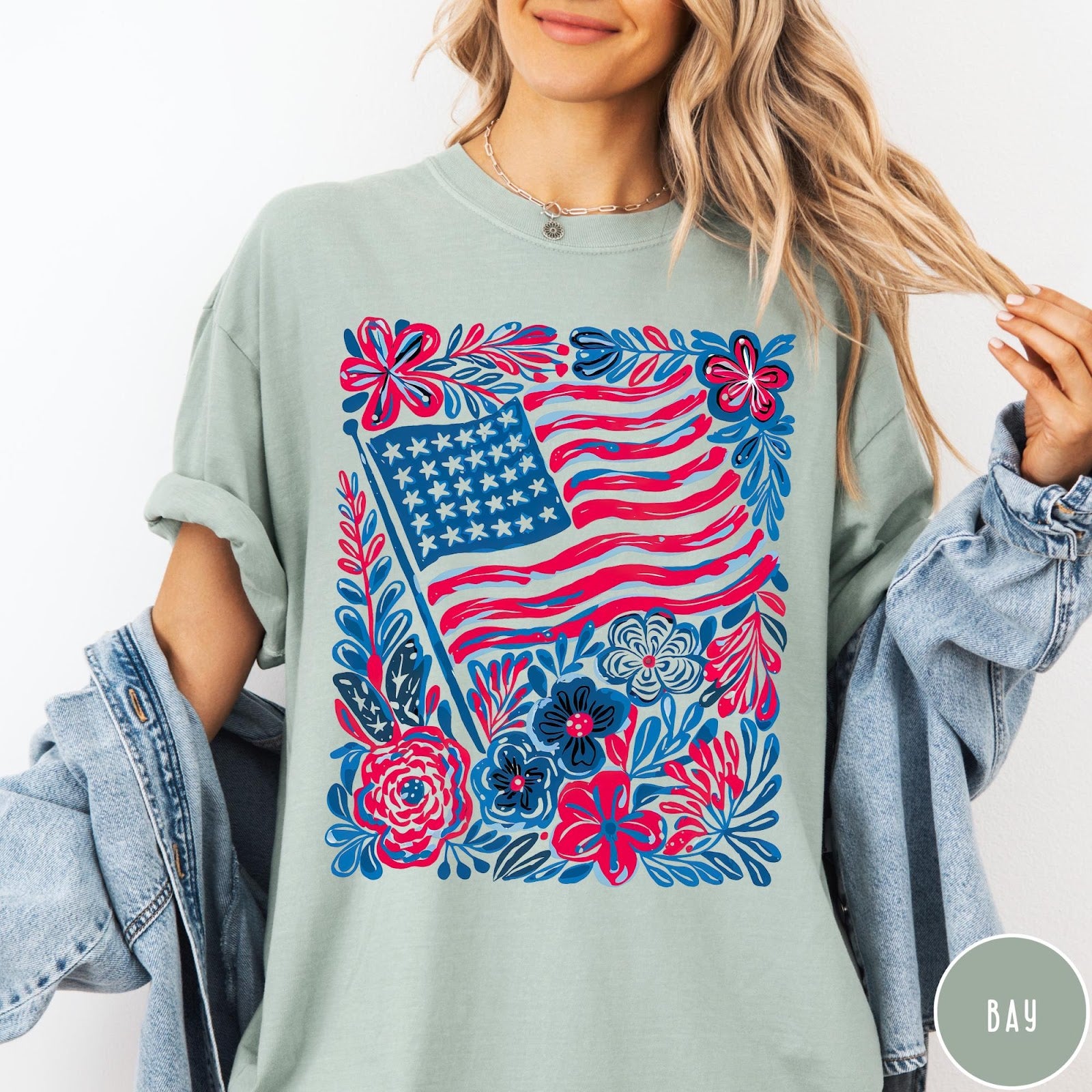 Comfort Colors tee in Bay featuring boho floral design with an American flag and colorful flowers