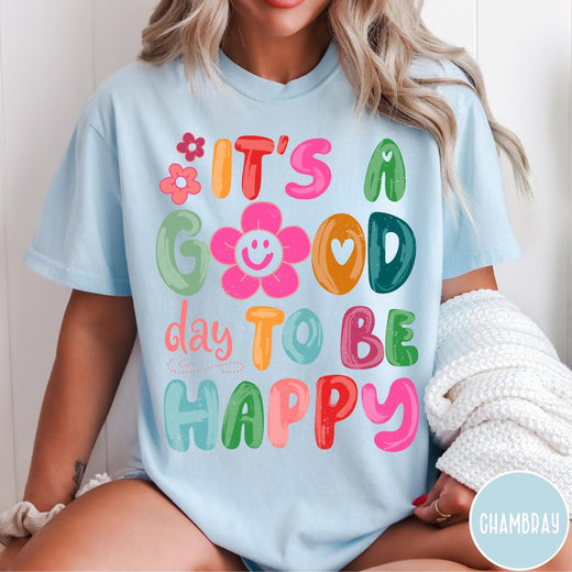 Comfort Colors tee in Chambray featuring typography and floral elements with a smiley face graphic design