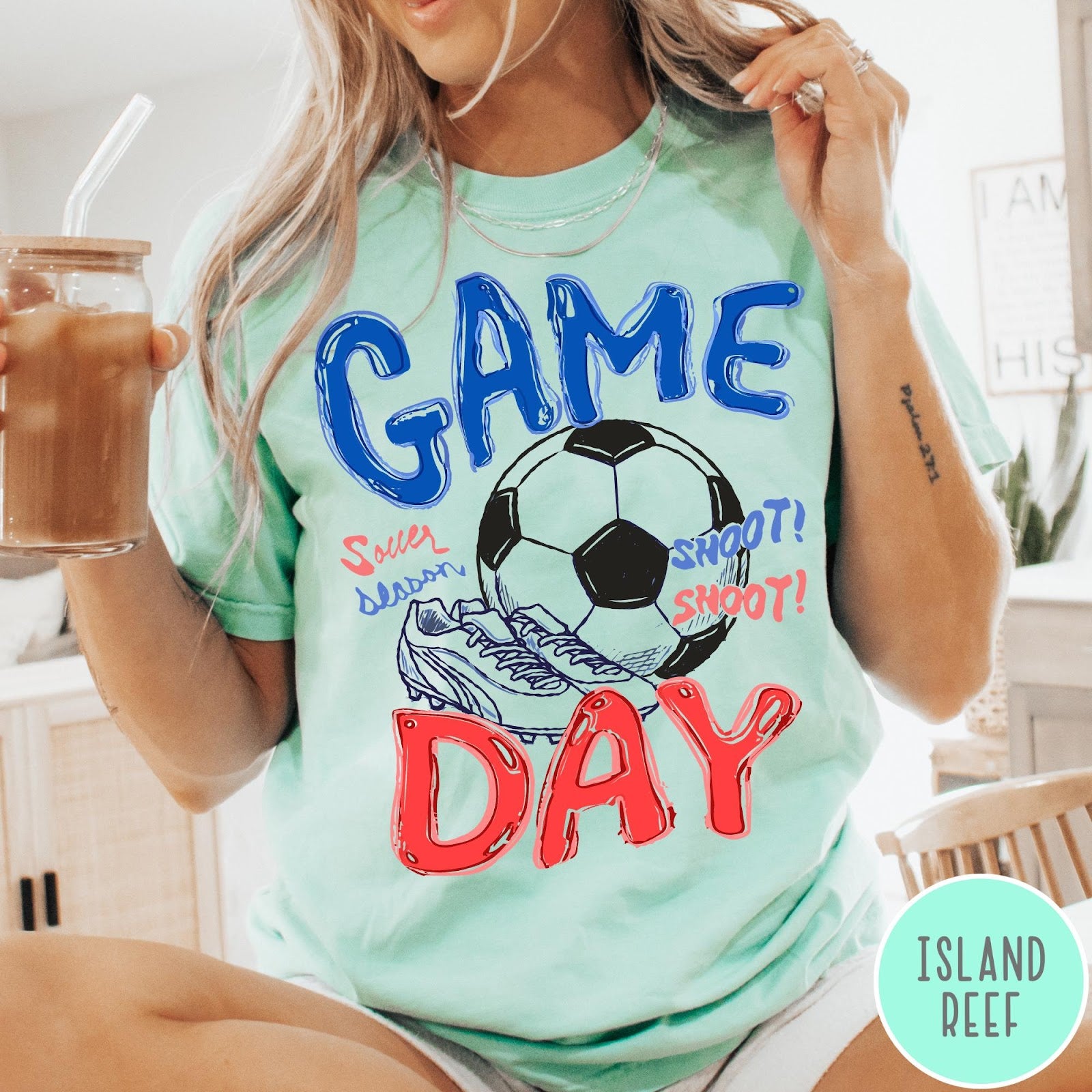 Comfort Colors tee in Island Reef featuring soccer graphic with a ball, cleats, and Game Day text