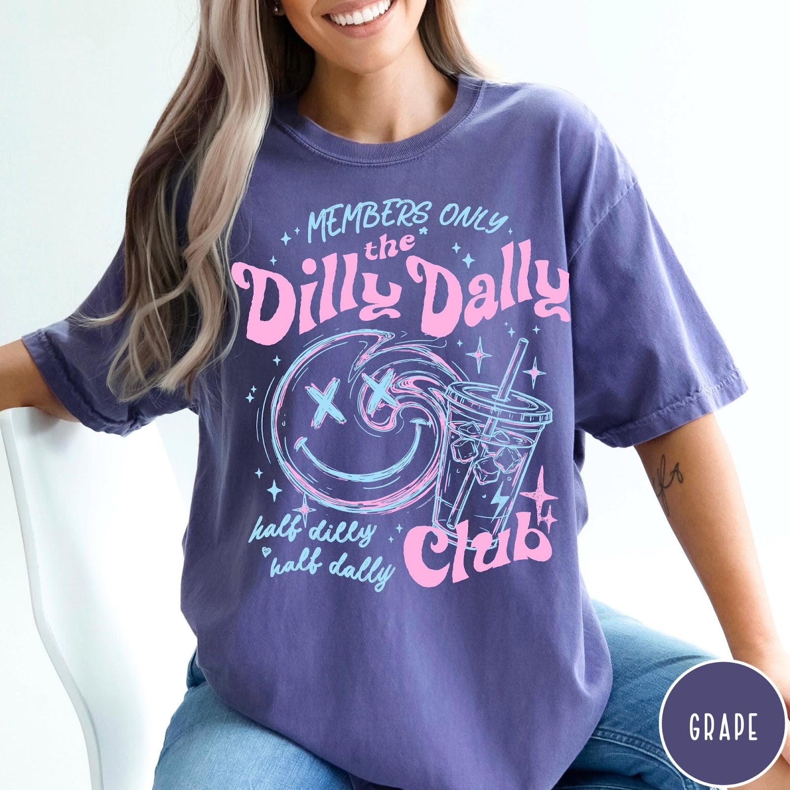 Comfort Colors tee in Grape featuring retro style graphic with a smiley face and iced coffee cup