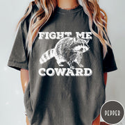 Comfort Colors tee in Pepper featuring screen printed raccoon graphic with Fight Me Coward text design