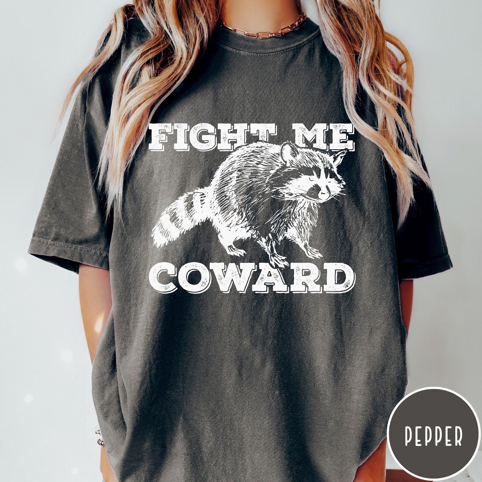 Comfort Colors tee in Pepper featuring screen printed raccoon graphic with Fight Me Coward text design