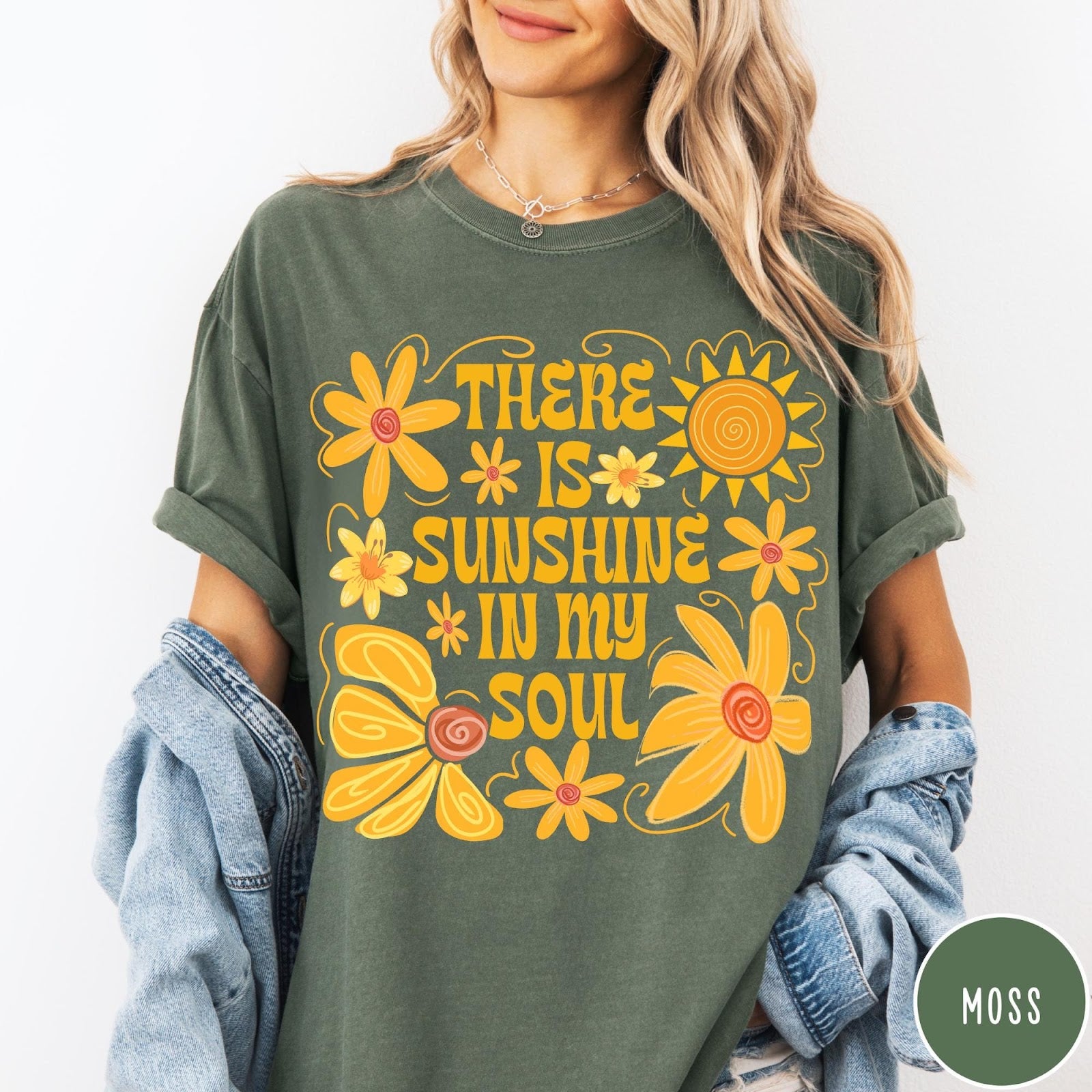 Comfort Colors tee in Moss featuring inspirational quote design with yellow flowers and a sun graphic