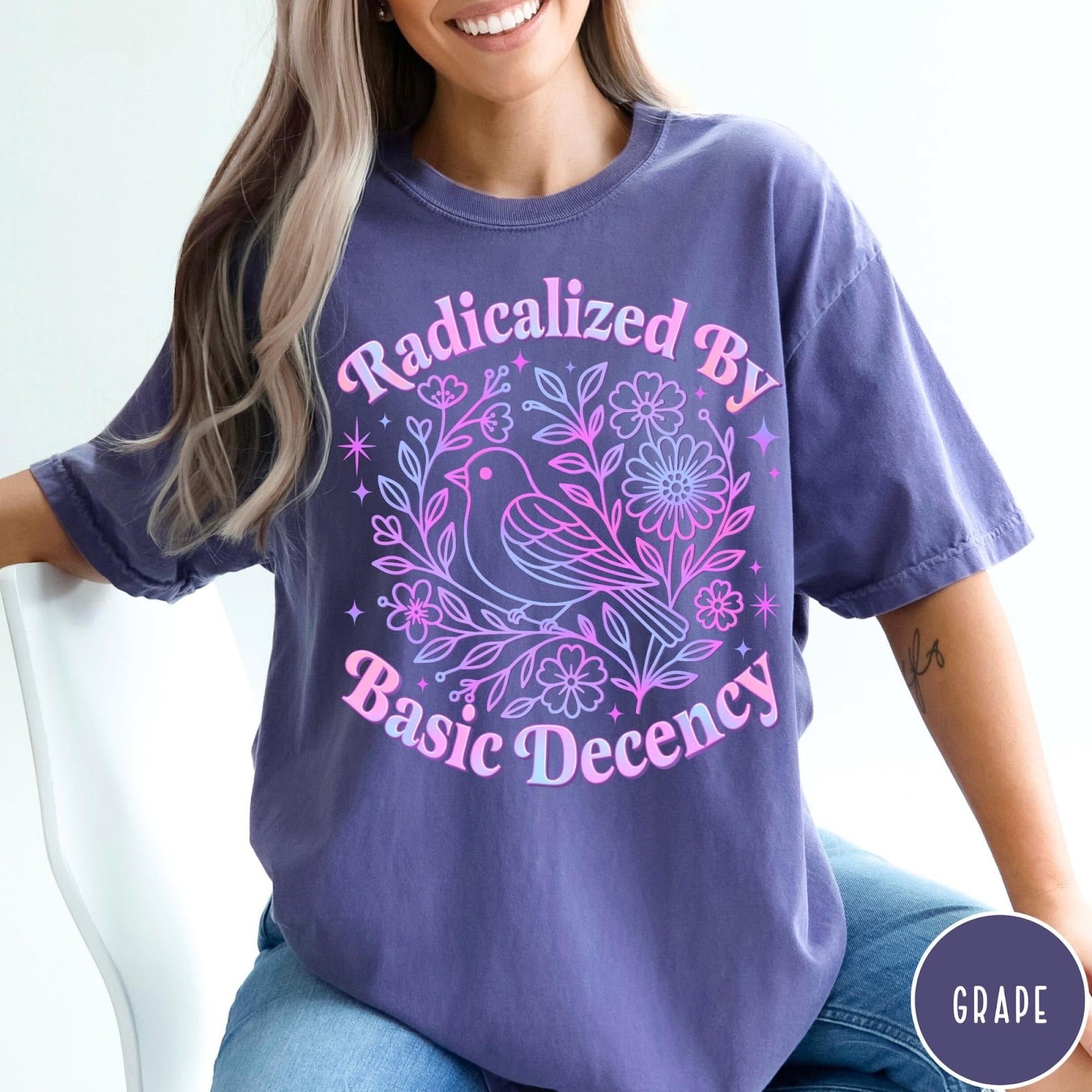 Comfort Colors tee in Grape featuring floral design style with a bird and flowers graphic print